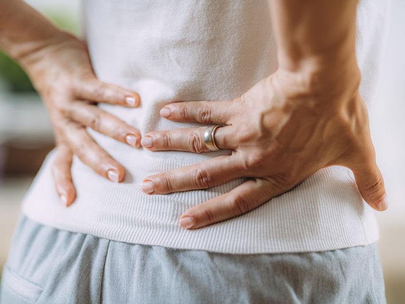 Hands on lower back