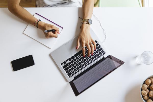 Hand on a laptop
