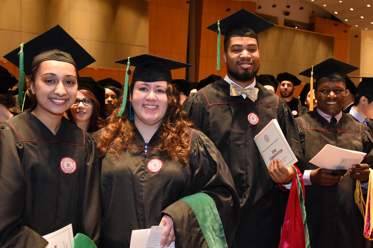 Smiling graduates
