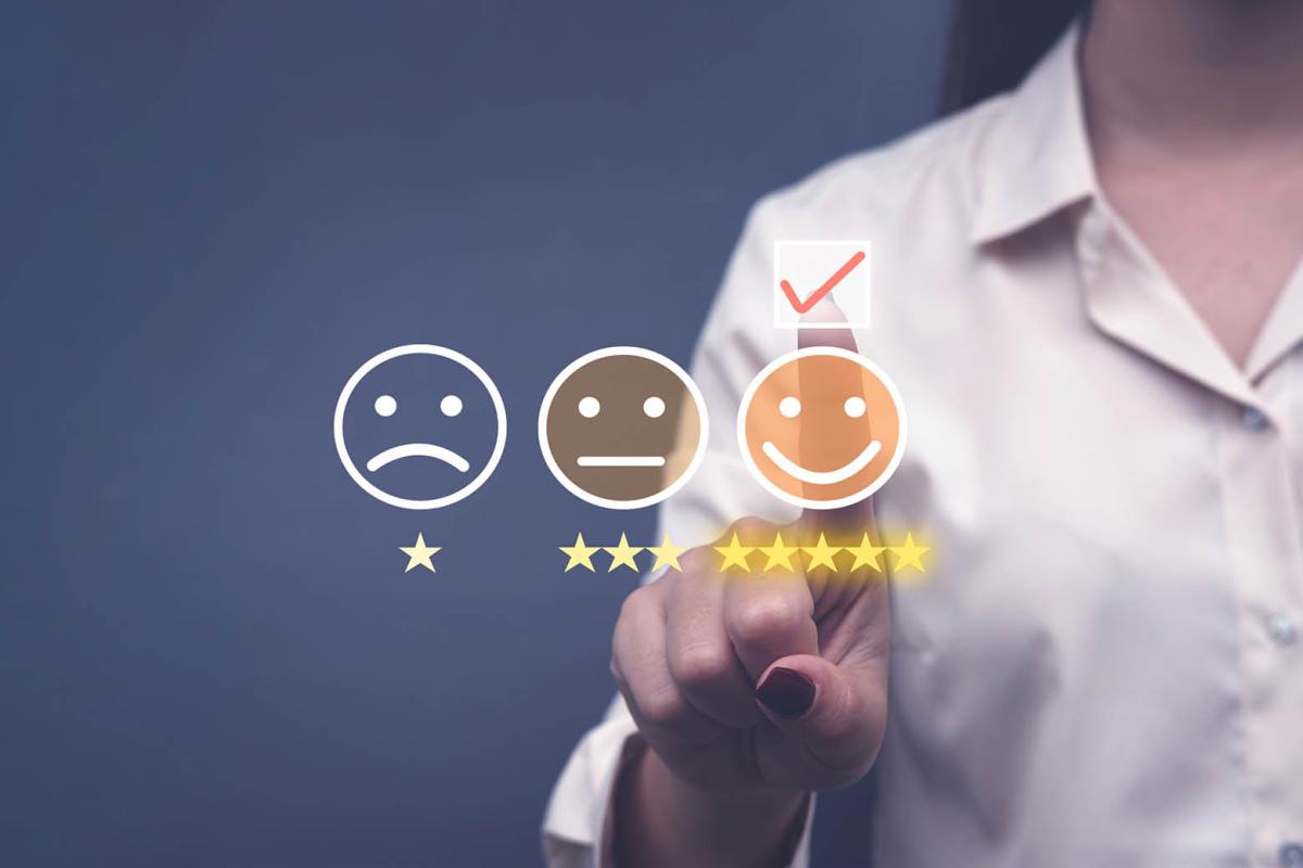 Graphic of customer survey with sad, indifferent and smiling faces