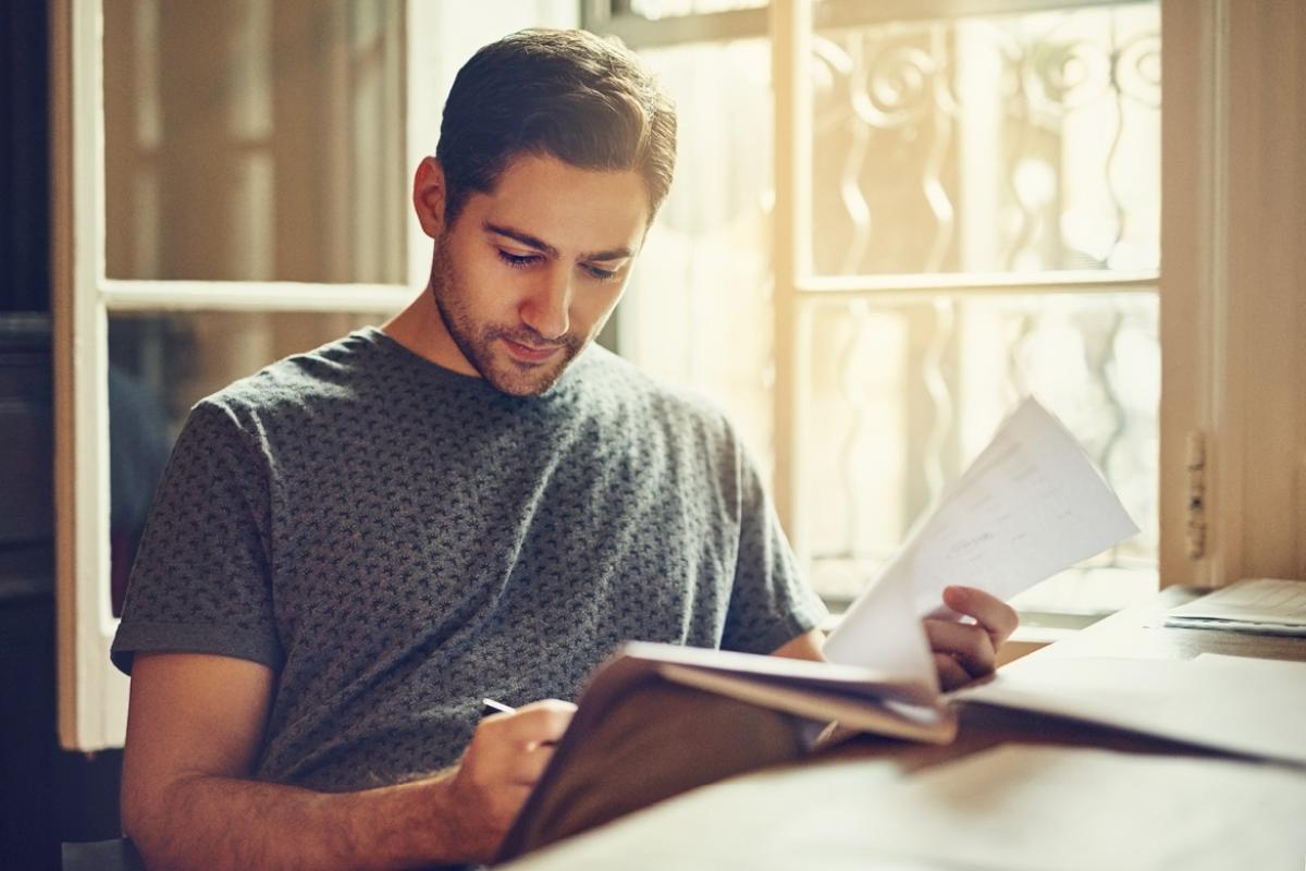 Young adult reviewing a contract