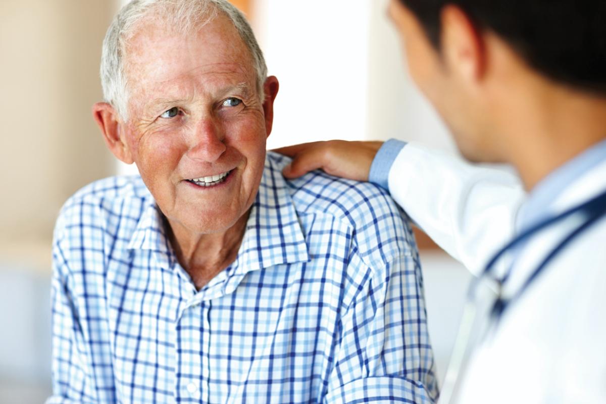 Physician with elderly patient