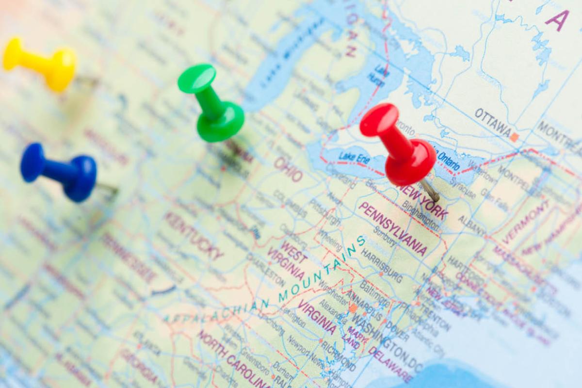 Push pins on a map
