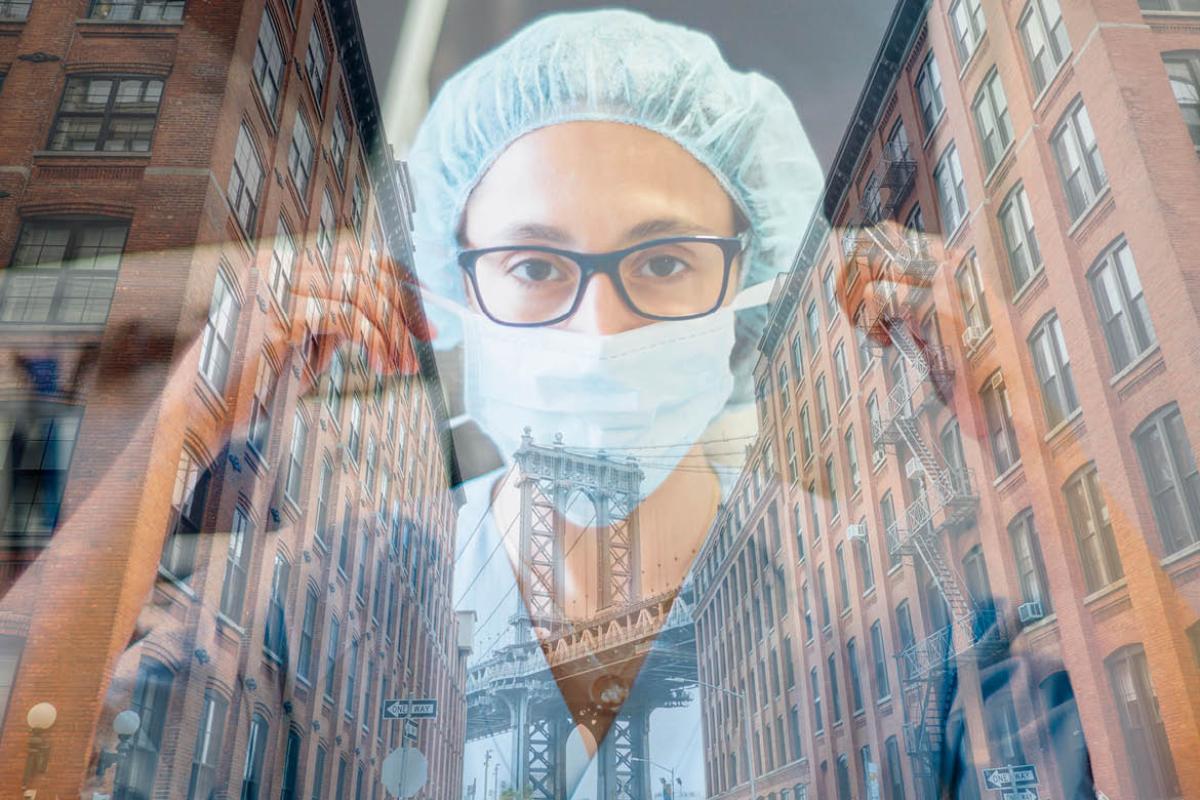 Health care worker superimposed over city buildings