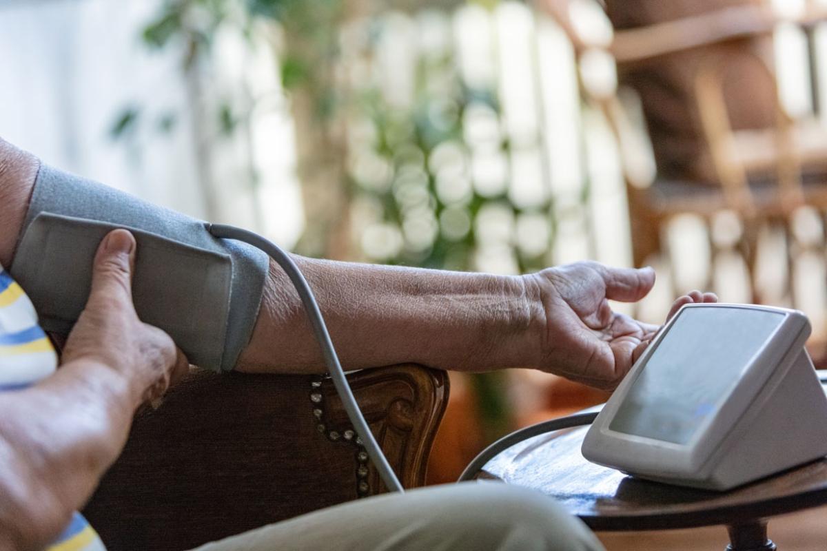 Close-up photo of patient monitoring their blood pressure