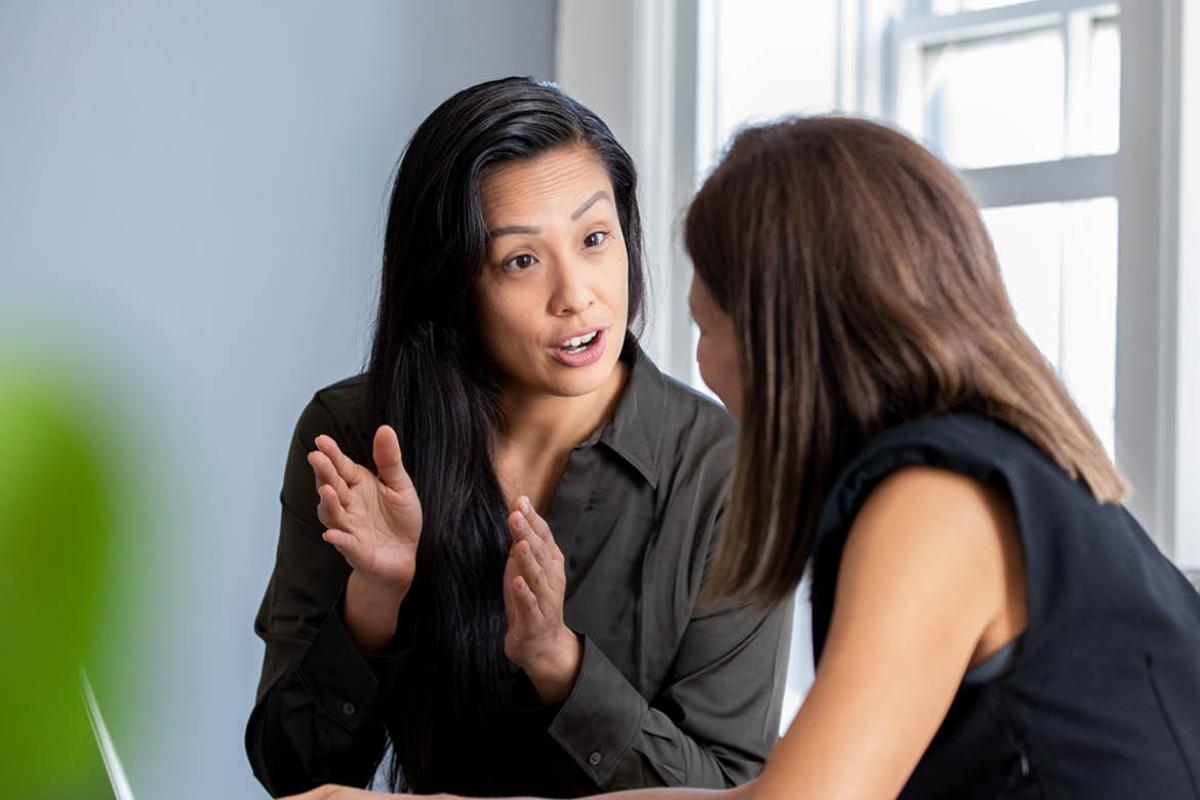 Two people in conversation