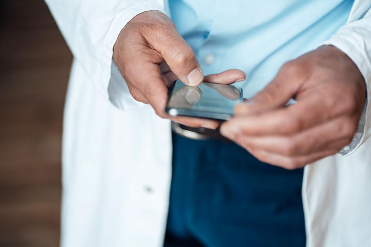  Hands holding a smartphone