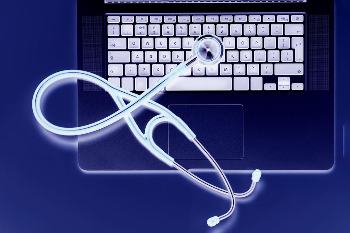 Stethoscope on laptop keyboard