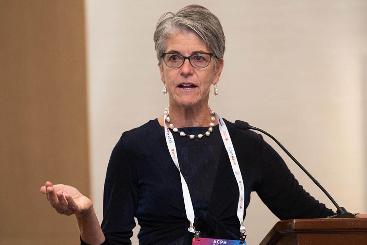 Christine Sinsky, MD at the lecturn