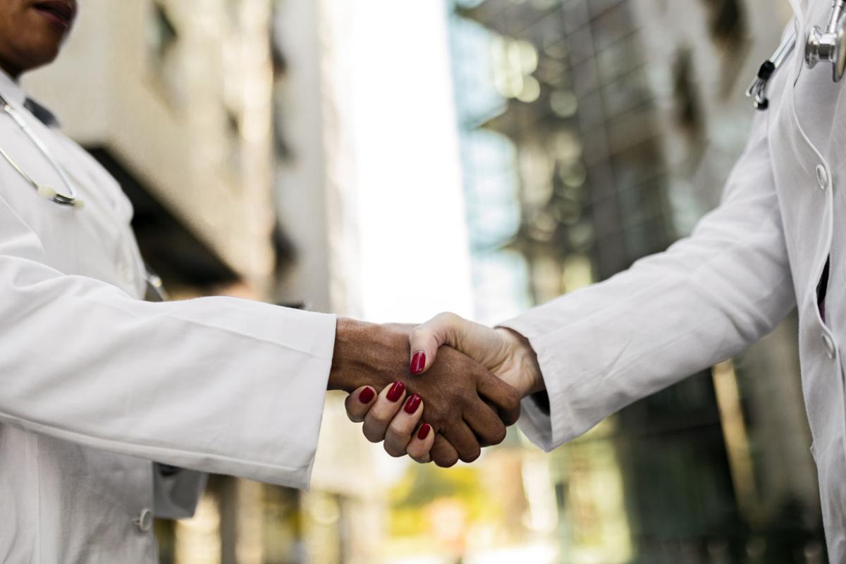 Two people shaking hands
