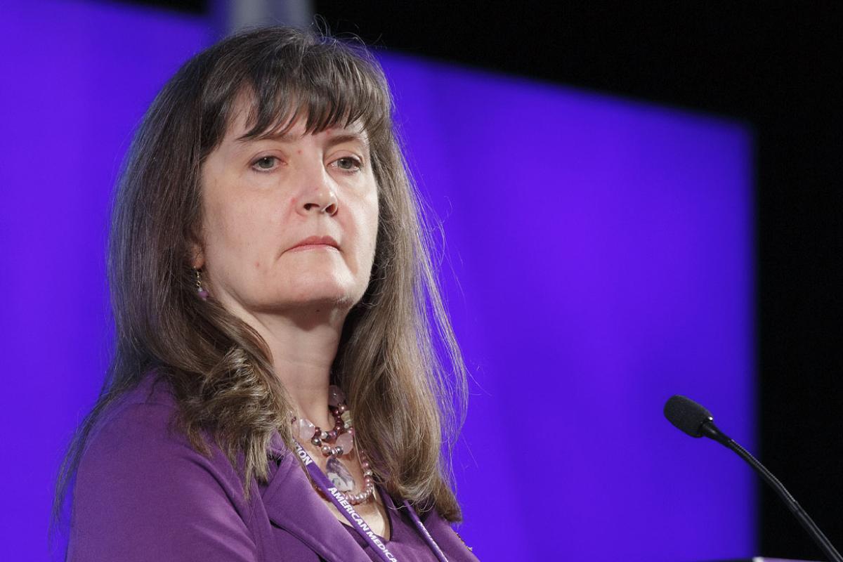 Attendee at the podium at the 2024 Annual Meeting of the HOD