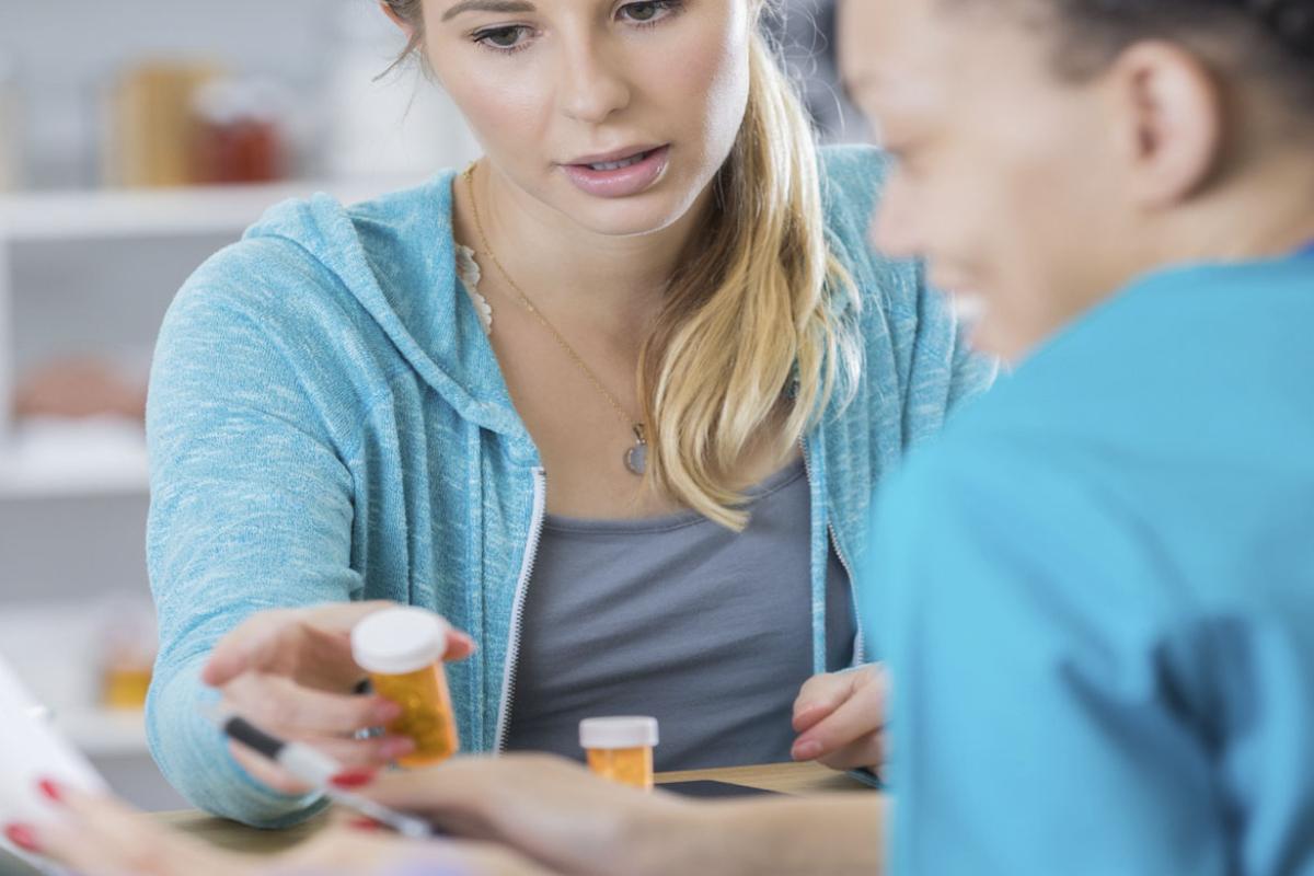 Patient looks at prescriptions