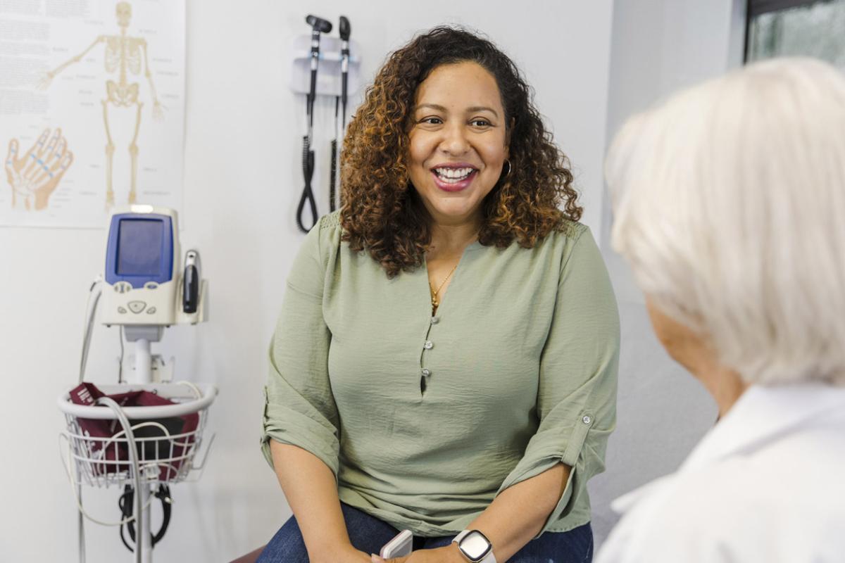 Doctor listens to patient