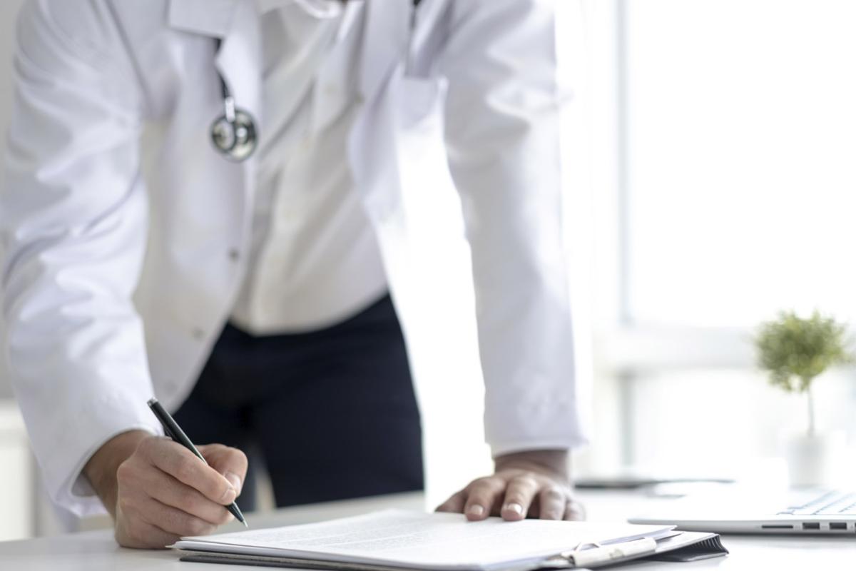 Physician signs a contract