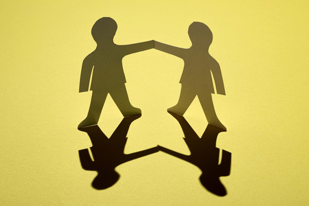 Paper cutouts in the shape of human figures