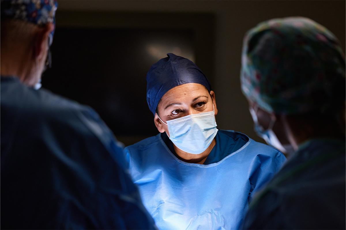 Attentive surgeon engaged in operation