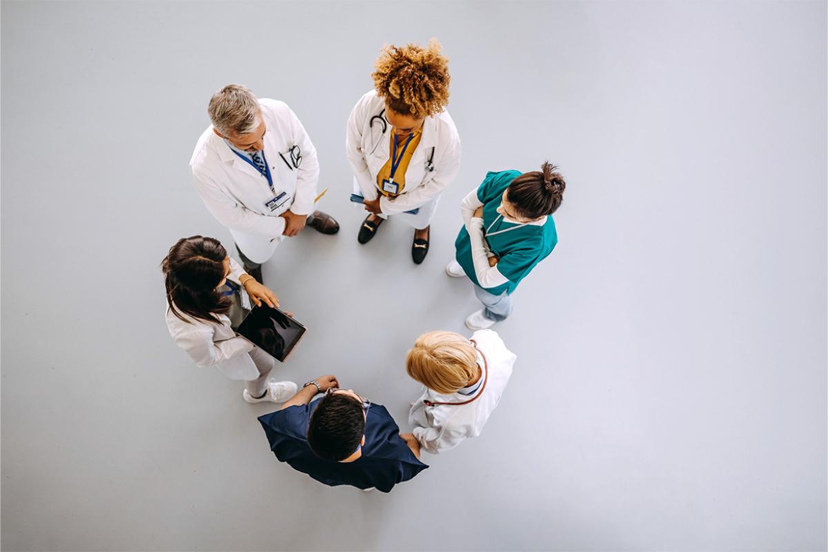 Health care workers in a circle