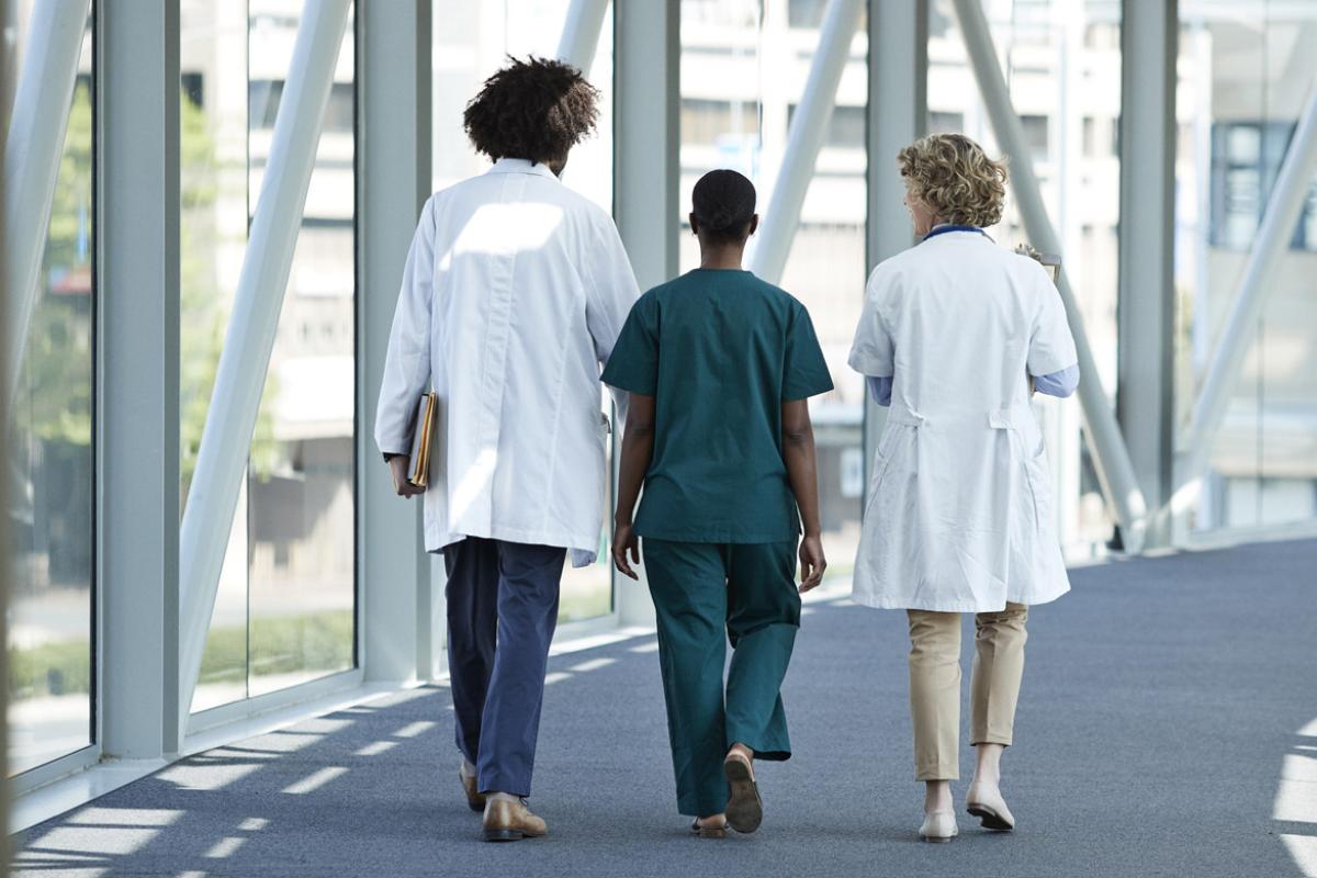 Healthcare professionals on walkway