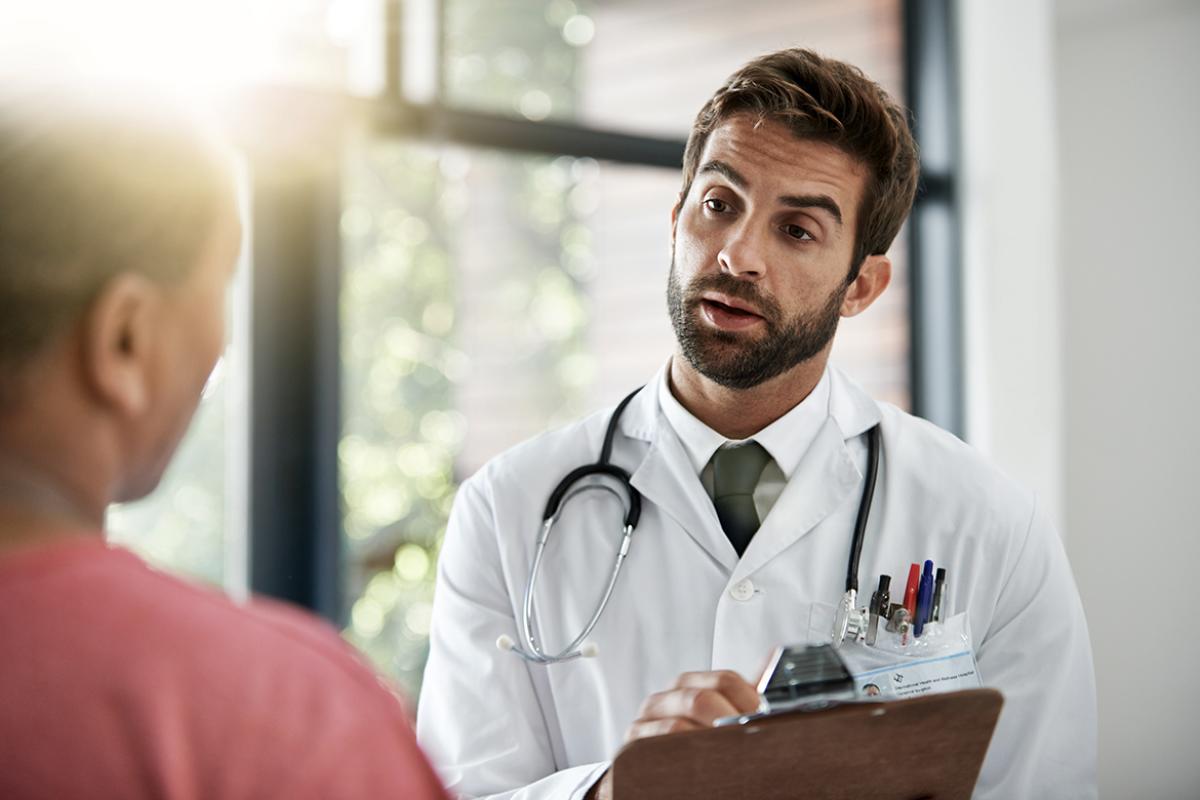Doctor in discussion with patient.